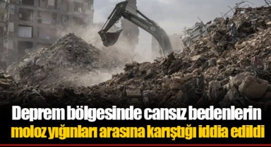 Deprem bölgesinde cansız bedenlerin moloz yığınları arasına karıştığı iddia edildi