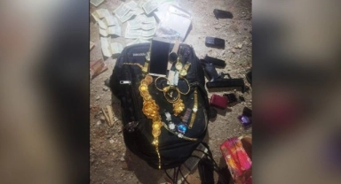 Hatay'da bir komiser yardımcısı ve bir bekçi, enkazdan değerli eşya çaldıkları şüphesiyle gözaltına alındı