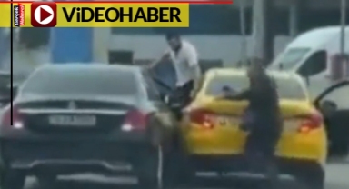 Trafik magandası, tartıştığı taksi şoförünü ezmeye çalıştı