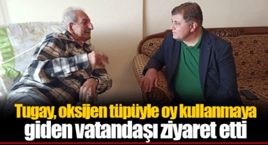 Tugay, oksijen tüpüyle oy kullanmaya giden vatandaşı ziyaret etti