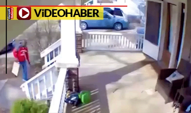 Kargo görevlisini hırsız sanarak evin kapısını yıkıp dışarı fırladı... Neye uğradığını şaşıran adam hızla uzaklaştı