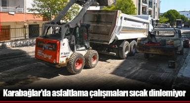 Karabağlar'da asfaltlama çalışmaları sıcak dinlemiyor