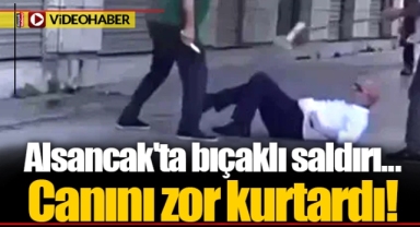 Alsancak'ta bıçaklı saldırı... Canını zor kurtardı!