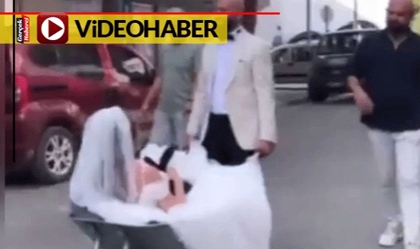 Damat, gelini el arabasına koyarak böyle götürdü