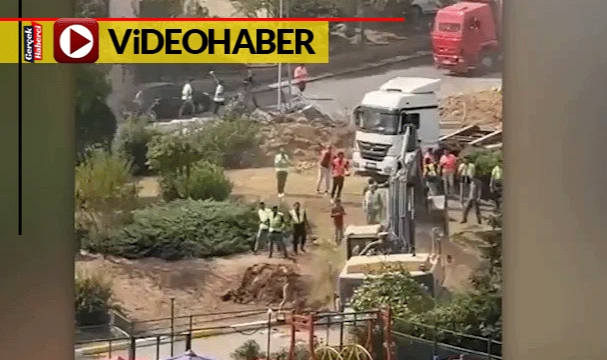 Kepçe, yıkıma karşı direnen site yöneticisinin kafasından aşağı toprak boşalttı