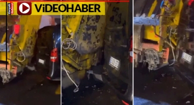 Çöp arabası yolu kapatan aracı ezdi geçti
