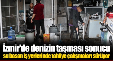 İzmir'de denizin taşması sonucu su basan iş yerlerinde tahliye çalışmaları sürüyor
