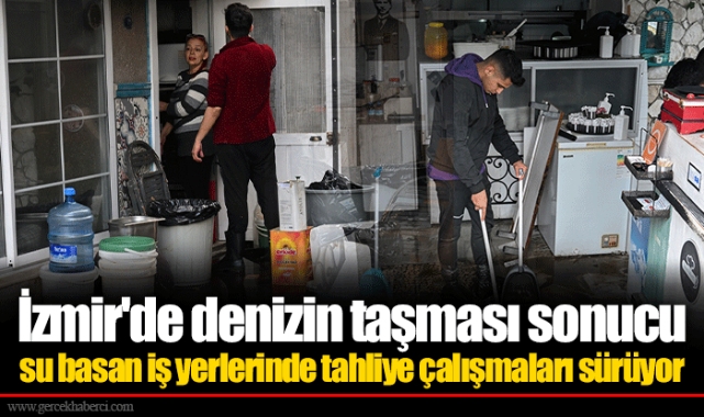 İzmir'de denizin taşması sonucu su basan iş yerlerinde tahliye çalışmaları sürüyor