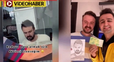 Kara kalem portresini çizen adama 100 euro verdi