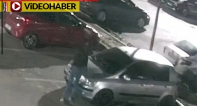 Otoparkta cam bırakmadı: 35 araca parke taşıyla girişti