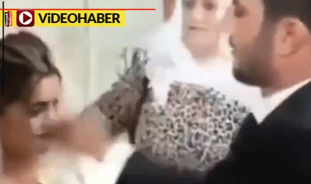 Gelinin duvağını açıp tokat attı