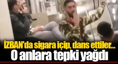 İZBAN'da sigara içip, dans ettiler... O anlara tepki yağdı