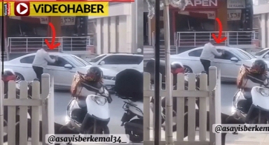 Park sorununu bahane etti... Otomobile kaldırım taşıyla saldırdı
