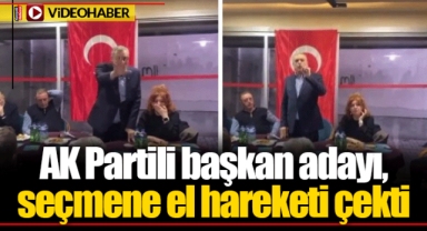 AK Partili başkan adayı, seçmene el hareketi çekti