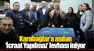 Karabağlar'a asılan 'İcraat Yapılmaz' levhası iniyor