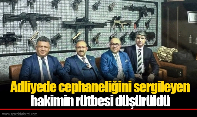 Adliyede cephaneliğini sergileyen hakimin rütbesi düşürüldü