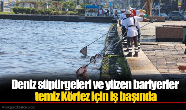 Deniz süpürgeleri ve yüzen bariyerler temiz Körfez için iş başında