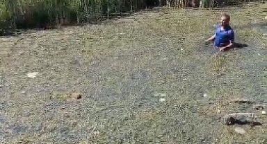Jandarmadan kaçmak için bataklığa saklandı, kaçamadı