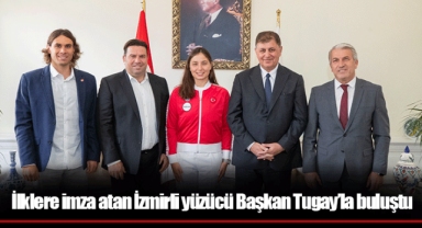 İlklere imza atan İzmirli yüzücü Başkan Tugay’la buluştu