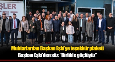 Bornova’da muhtarlardan Başkan Eşki’ye teşekkür plaketi
