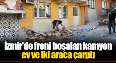 İzmir'de freni boşalan kamyon ev ve iki araca çarptı