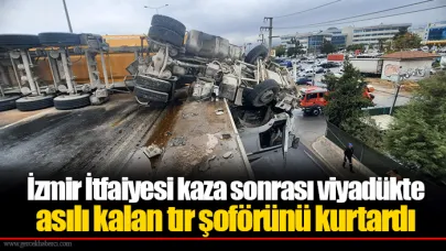 İzmir İtfaiyesi kaza sonrası viyadükte asılı kalan tır şoförünü kurtardı