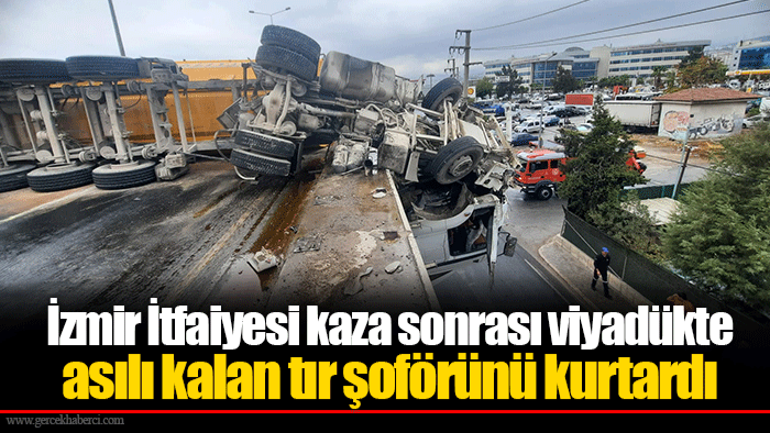 İzmir İtfaiyesi kaza sonrası viyadükte asılı kalan tır şoförünü kurtardı