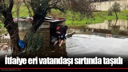 İtfaiye eri vatandaşı sırtında taşıdı